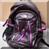 L09. Purple The North Face backpack.